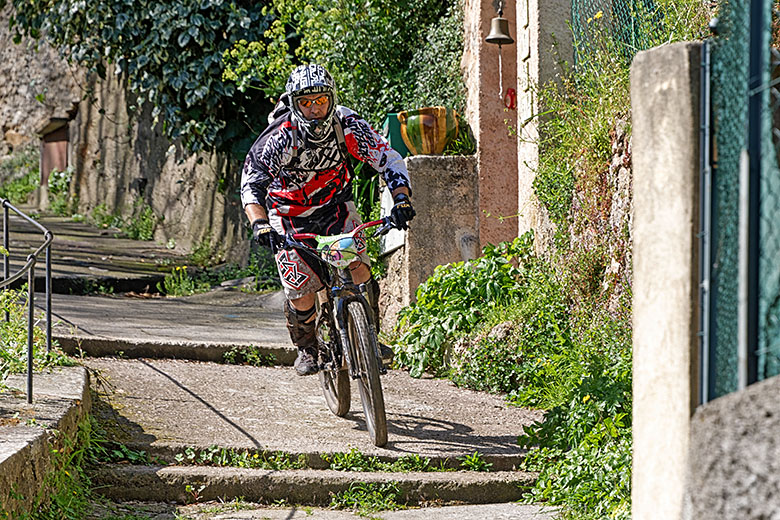 Racing down the steps leading up to the village