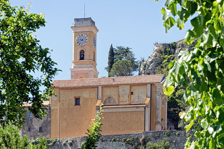 The yellowish church can be seen from far away