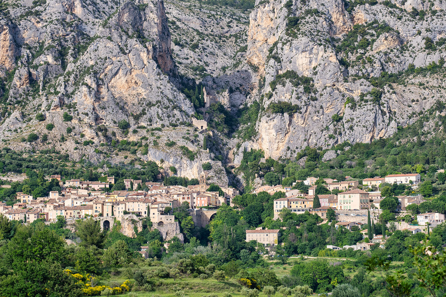 The village of Moustiers-Sainte-Marie photographed from across the valley