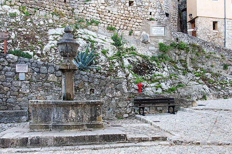 The fountain at the entrance of the village