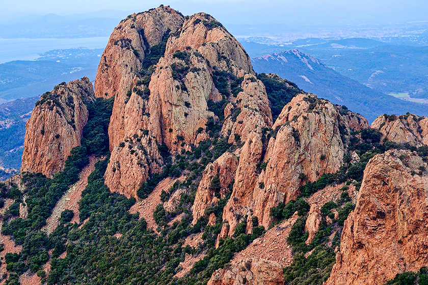 The usually reddish color of the rock...