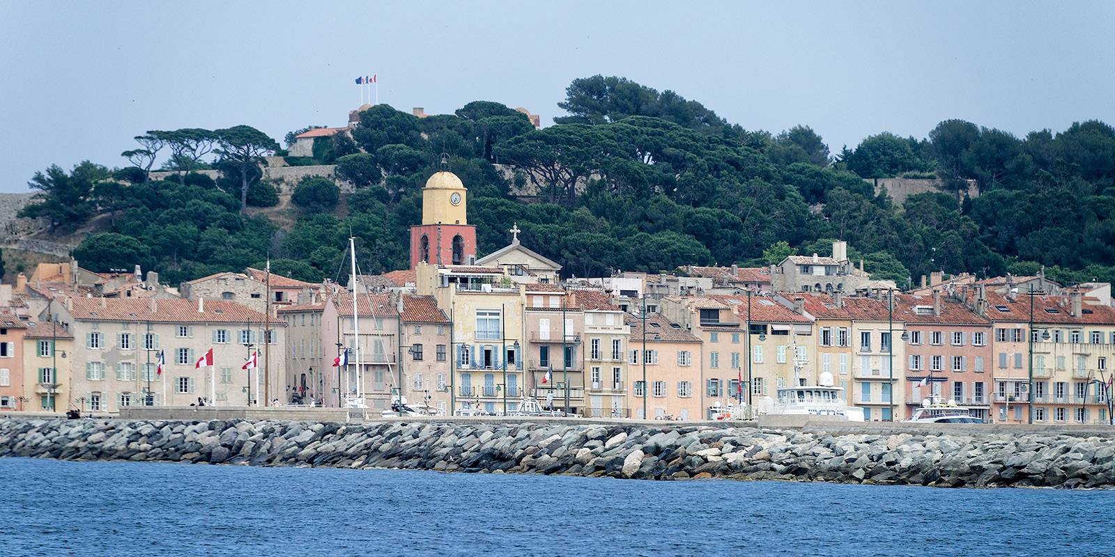 The village with its iconic red and yellow church tower