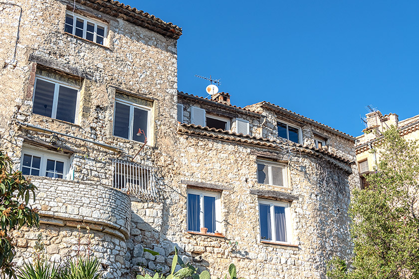 The houses form a wall that protects the village