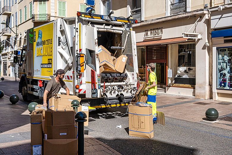 One week before the partial reopening, workers in town are busy