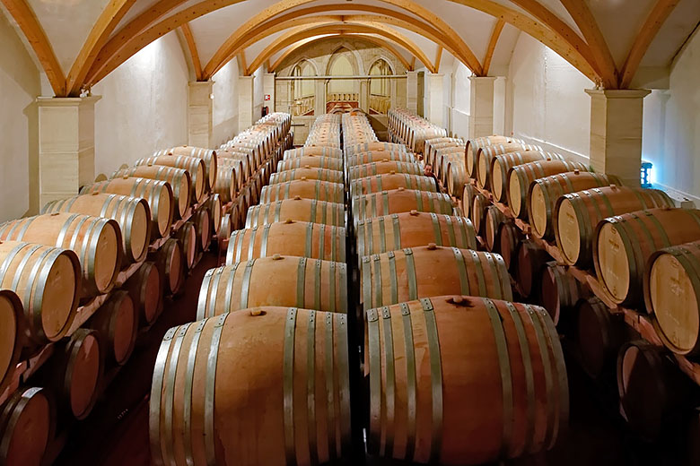 The climate-controlled main hall of barrels
