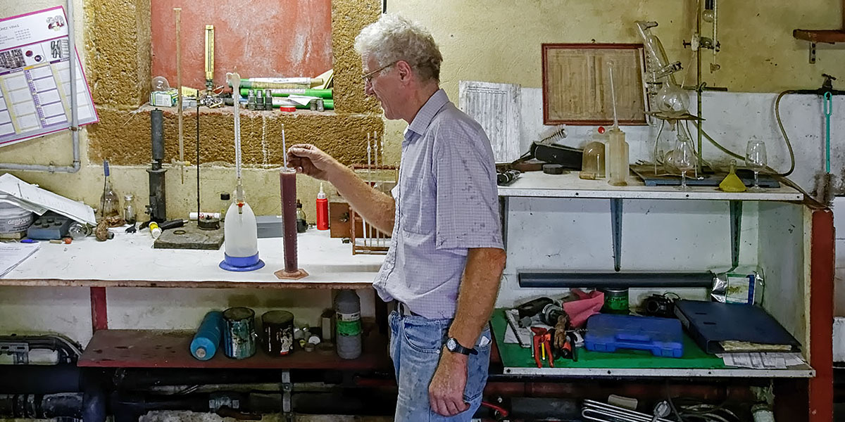 Christian Berthet-Rayne checks the alcohol level of what will become a 2011 Châteauneuf-du-Pape