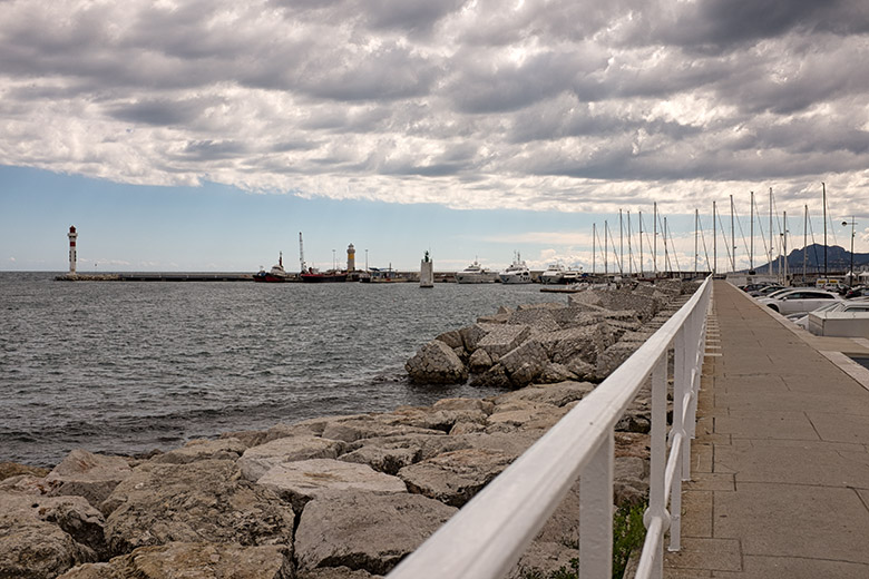 On the east end of the harbor