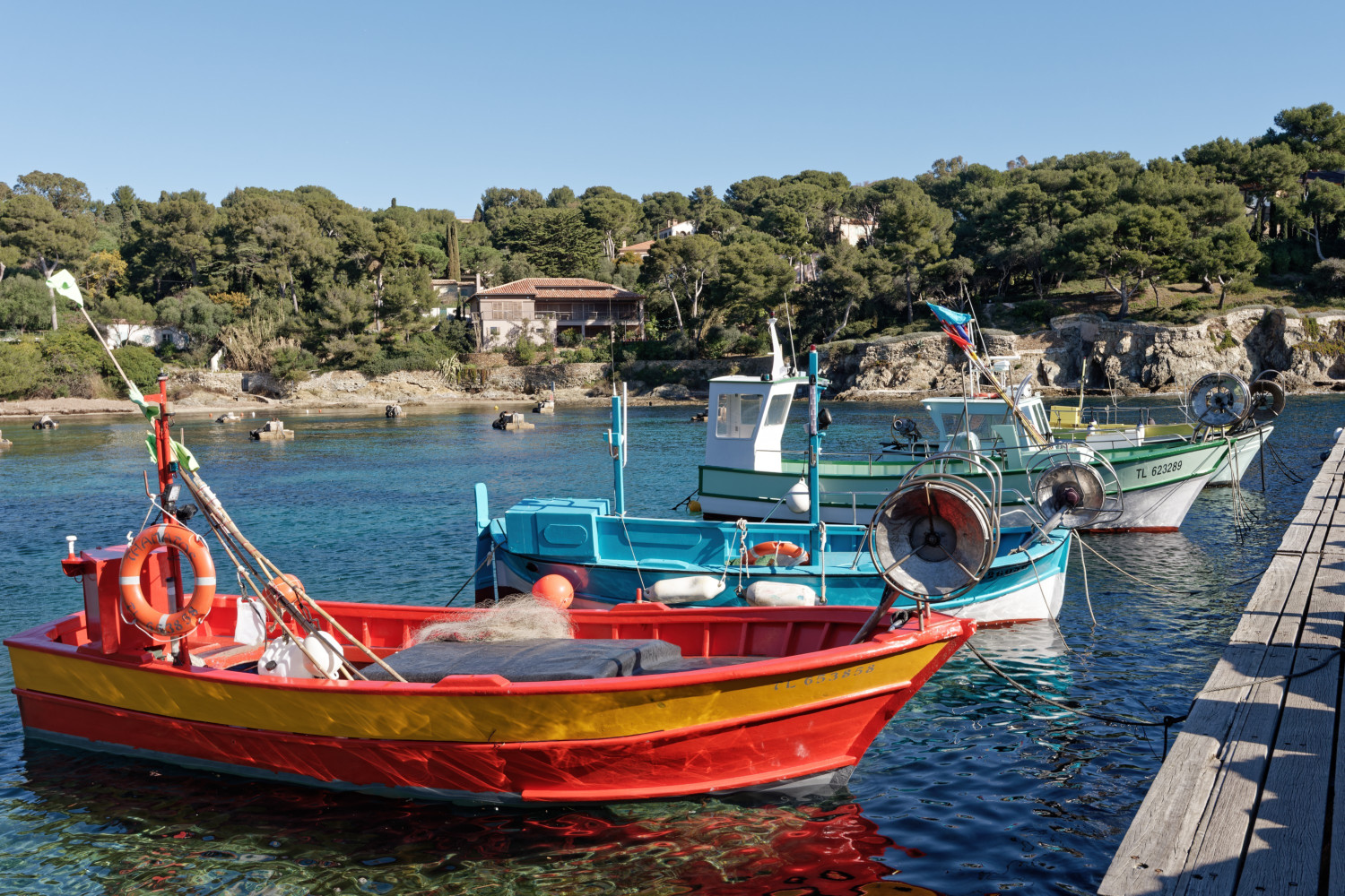 Line of colorful fishing boats