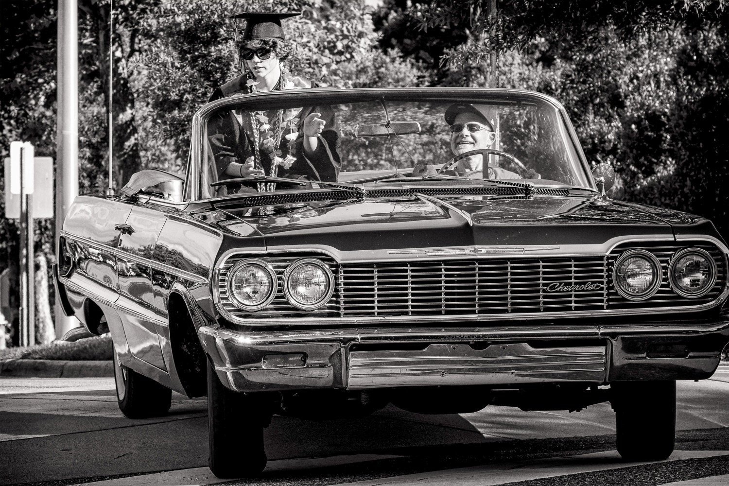 Participant in a high school graduation motorcade