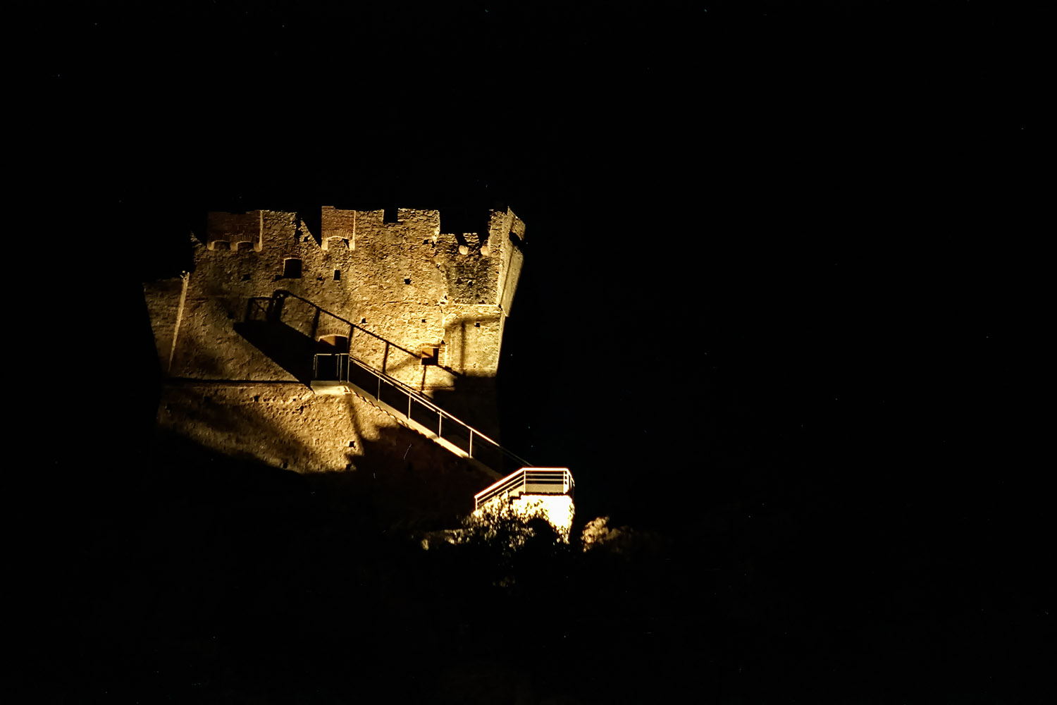 The Genoese tower of Porto at night