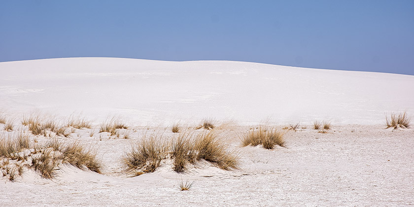 The white sand dunes look very much like snowy slopes