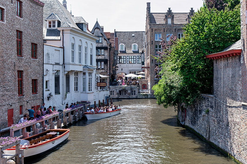 People waiting to board a boat for a canal trip