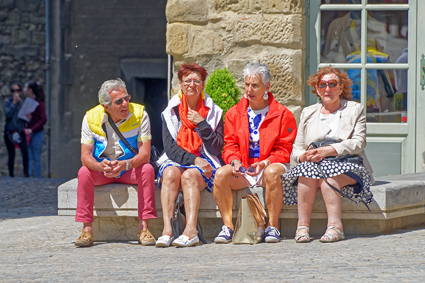Tourists resting on the 'Place Saint-Nazaire'