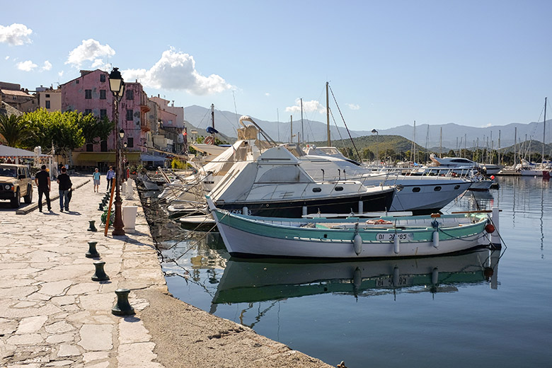 Walking along Saint-Florent's harbor