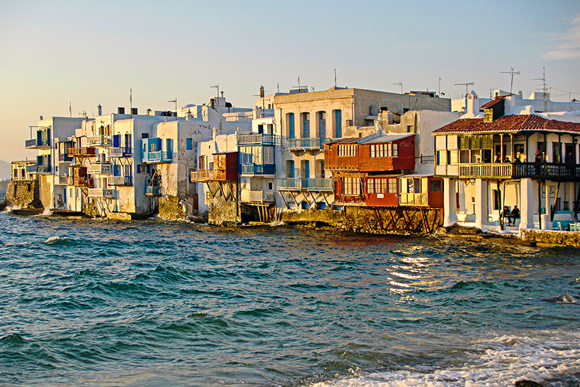 Houses near the water in the evening sun