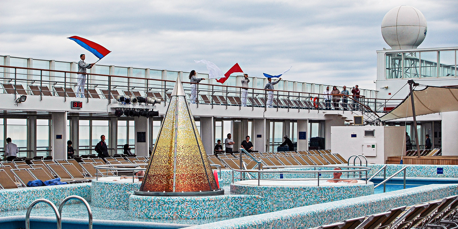 Flag-waving ceremony to mark the end of the cruise