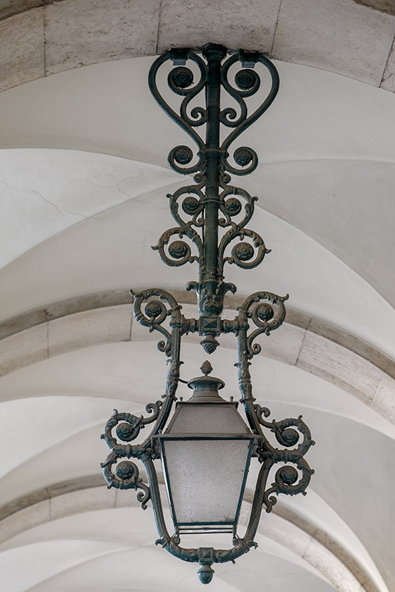 One of the wrought iron hanging lanterns