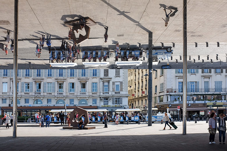 Under Foster + Partners' Mirrored Canopy