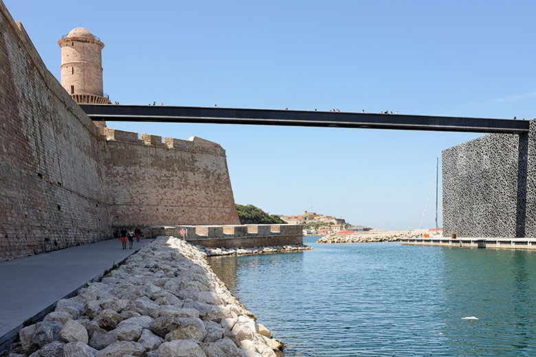 A footbridge connects the museum's two main areas