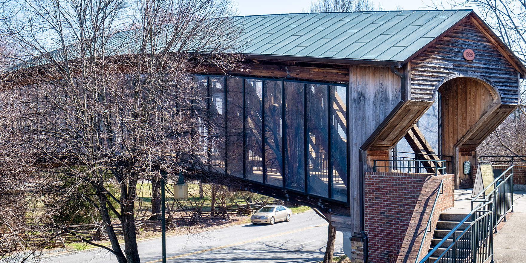 The covered Heritage footbridge leading from the visitor center to Old Salem Main Street