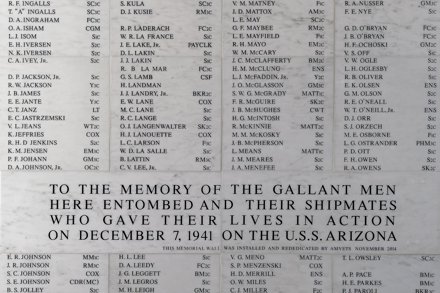 A portion of the marble wall listing the names of those killed on December 7, 1941
