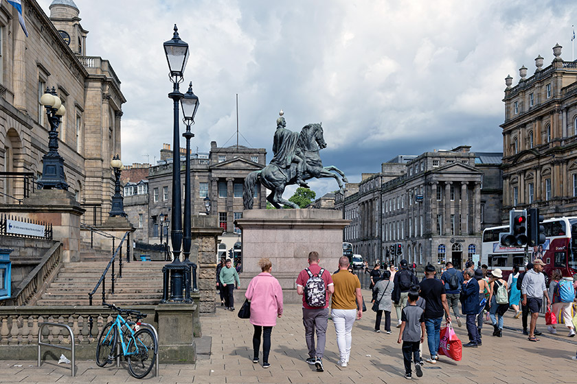 Walking past the Duke of Wellington statue to Waterloo Place