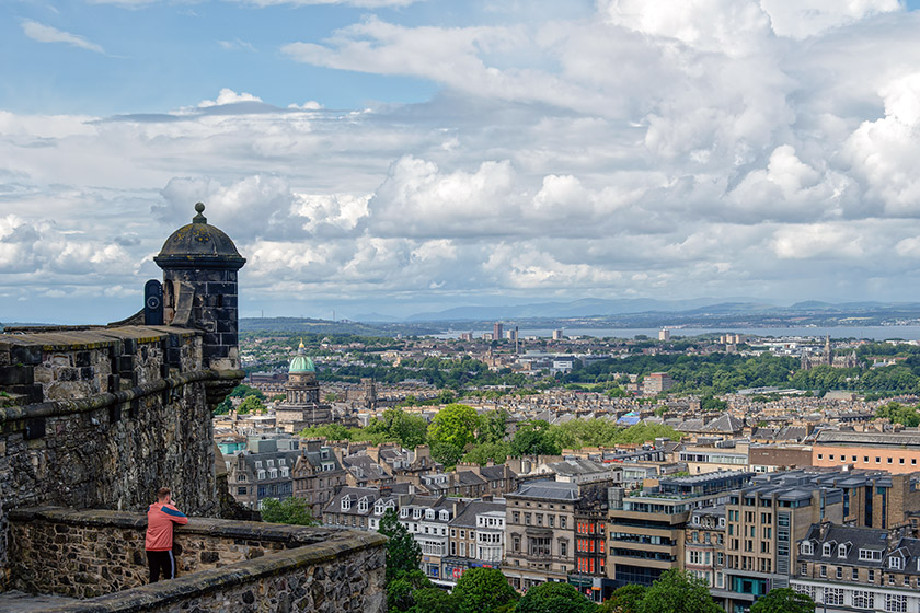 Looking past the turret to the green-domed West Register House