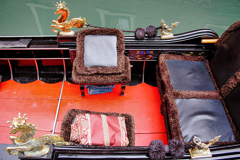 The gondoliers take pride in keeping their gondolas clean and polished